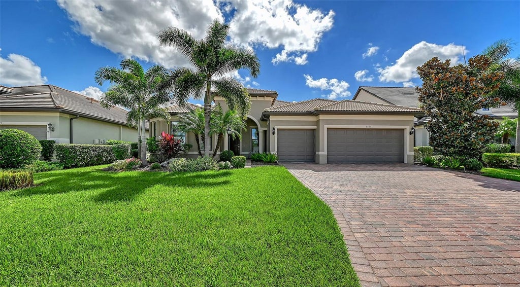 Photo of 6827 Gosport Cove, Bradenton, FL 34202 (MLS # A4709305)