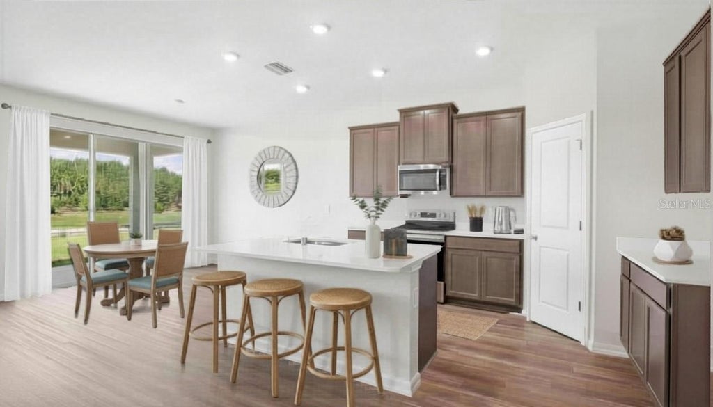 Photo of 11860 Memorial Drive, Brooksville, FL 34613 (MLS # TB8555386)