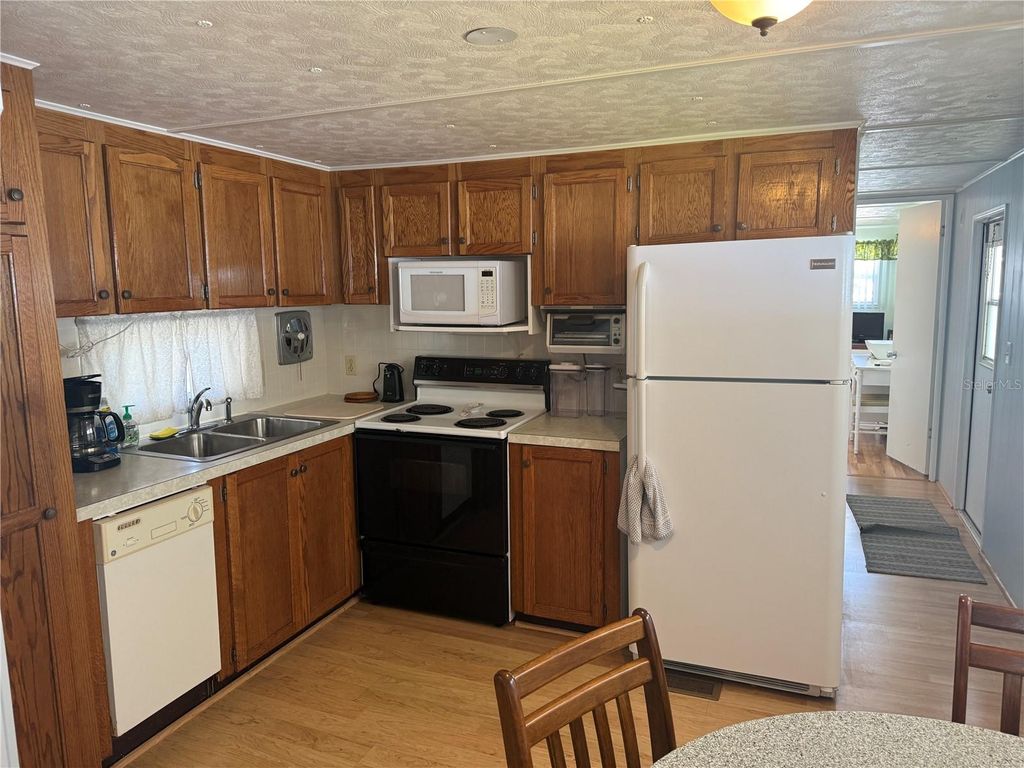 Photo of 731 Camellia Drive, Venice, FL 34293 (MLS # N6143633)