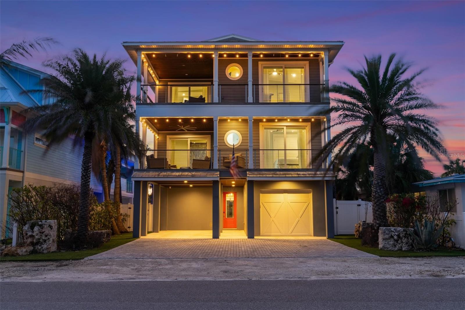 Welcome to your dream coastal retreat at 108 Magnolia Ave on the north end of Anna Maria! This stunning 4 bedroom, 4 bathroom home is just three houses away from the pristine Gulf of Mexico beach, offering the perfect blend of luxury and island living. Located on a sought after street, west of gulf drive and being one of the unique VERY deep lots is one of the many reasons why you don’t want to pass up this opportunity! Step inside to discover high-end finishes throughout, showcasing impeccable craftsmanship and style. The open-concept living spaces flow seamlessly for an indoor/outdoor living and entertaining experience. The kitchen has a large island, 2 sinks, high end stainless steel appliances including thermador 6 burner stove. Additionally, there is a wet bar including a subzero fridge and wine cooler which holds 65 bottles of wine! There are multiple balconies, 3 of which have awesome partial Gulf of Mexico views! Step outside to your private oasis featuring a large heated pool and spa, ideal for relaxing or entertaining. Enjoy lounging on the balconies under the string lights and gulf breeze. Hang out back at the outdoor bar, play some put put golf in the turfed side area or a game of ping pong! New pool pump and pool heater. 2 car epoxied garage but have fit 8 cars total in garages and driveway! Elevator, wood like ceramic tile through out, office area, and more! With the Sandbar restaurant and Captain Anthony’s being your backyard neighbors, it is fun and convenient for all! Even the Blackstone and the Golf cart is included!!!! Spacious and beautifully designed, this home is your gateway to the ultimate beach lifestyle on Anna Maria Island. Paradise awaits!