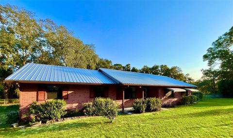 Photo of 137 Oak Circle, Interlachen, FL 32148 (MLS # GC534177)