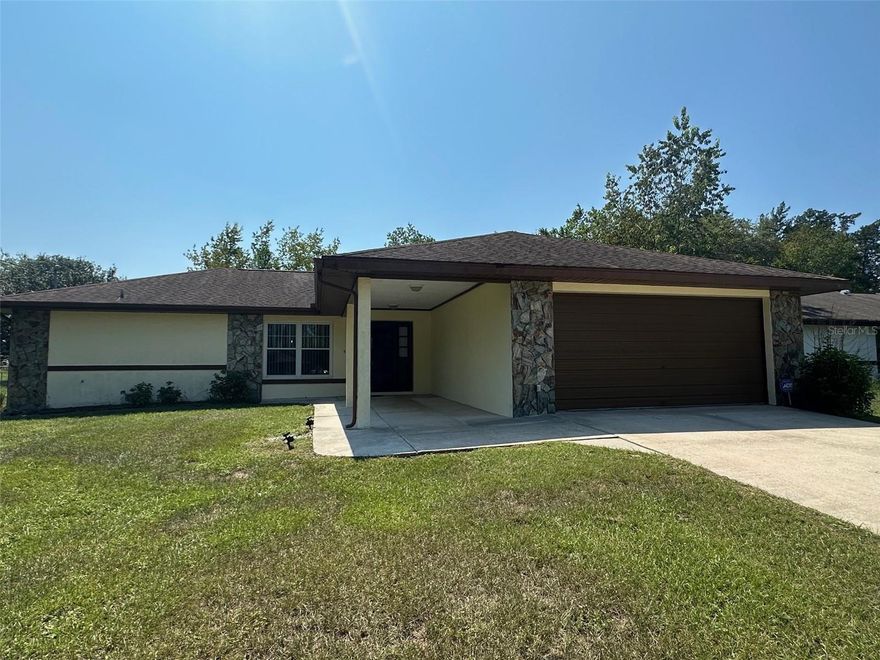 One or more photo(s) has been virtually staged. Check out this affordable home in Rainbow Lakes Estates! It features a spacious eat-in kitchen with sleek granite countertops, newer cabinets, and a cool backsplash that makes cooking a joy. The master bedroom is a real treat, recently updated with fresh paint and stylish vinyl plank flooring. You’ll love the walk-in shower and the convenience of his and her closets. The split floor plan means everyone gets their own space with roomy bedrooms. Step outside to the large screened porch where you can relax and take in the view of your backyard. There are two utility sheds for extra storage, and the yard is partially fenced for some added privacy. Recent updates are a big plus: a brand-new AC unit and water heater, a roof from 2017, and a drainfield from 2019, plus windows that were updated in 2008. This home is a great find—come see it for yourself!  Rainbow Lakes Estates is a family-friendly community, no HOA fees, the community offers lake access with a dock, boat slip, playground, shuffleboard, community center, baseball field, picnic tables, a gym that is available for the household at $50r/ year and so much more. For convenience located at entrance to the neighborhood is a gas station, restaurant, and convenient store. The home is located 15 minutes from downtown Dunnellon, with antique shops, community events, doctors, restaurants, shopping, Rainbow Springs State Park, Rainbow & Withlacoochee River access, Blue Run Park w/trails that lead all the way to Tampa. The World Equestrians Center & Ocala are a 20–30-minutes' drive. Many opportunities nearby for Golfing, fresh or saltwater fishing, and many parks.