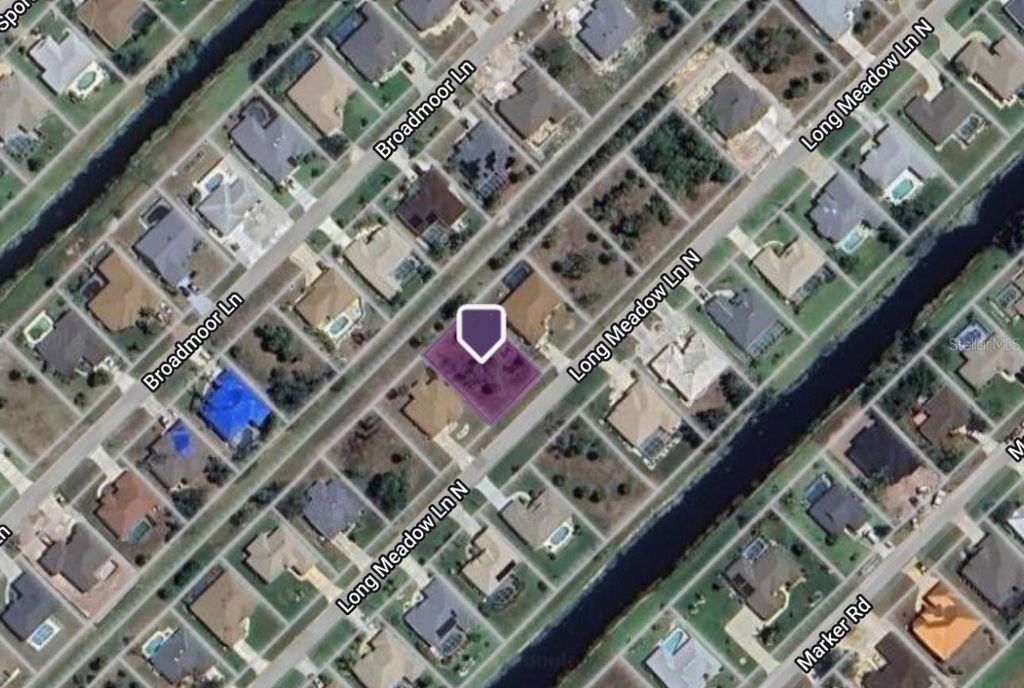 Photo of 77 Long Meadow Lane, Rotonda West, FL 33947 (MLS # C7492666)