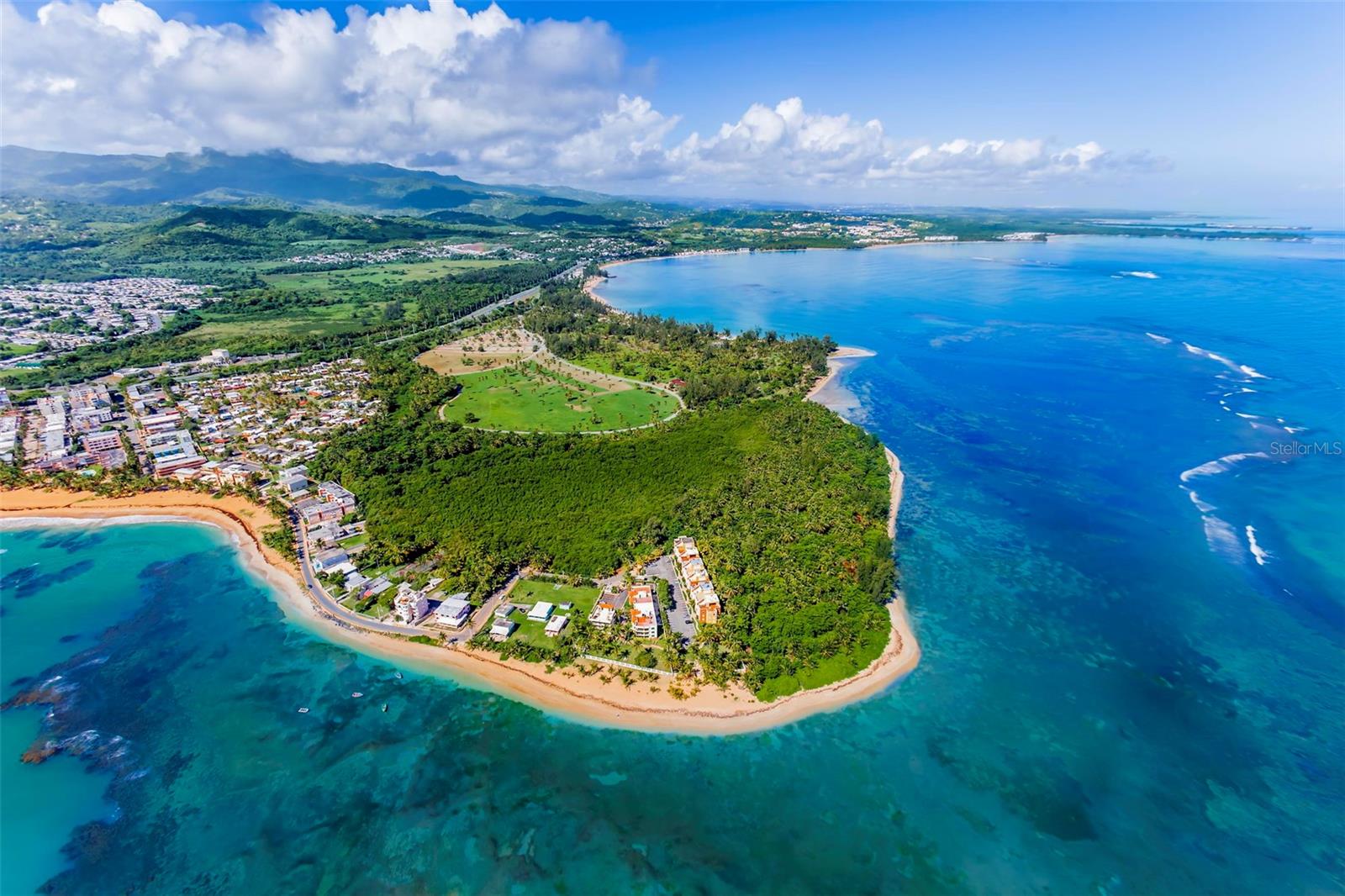 Punta Bandera is an 18-acre property located in a stunning natural setting with 1,320 linear feet of direct beach access. The crystal-clear waters are protected by a reef, creating a calm sea ideal for swimming, snorkeling, and enjoying nature. Surrounded by lush vegetation and breathtaking views, this is a true retreat where privacy, beauty, and tranquility come together. The property also features areas ready for development, offering investment potential. Conveniently located close to restaurants, shopping centers, and within an easy drive to the international airport, Punta Bandera combines breathtaking natural beauty with accessibility.