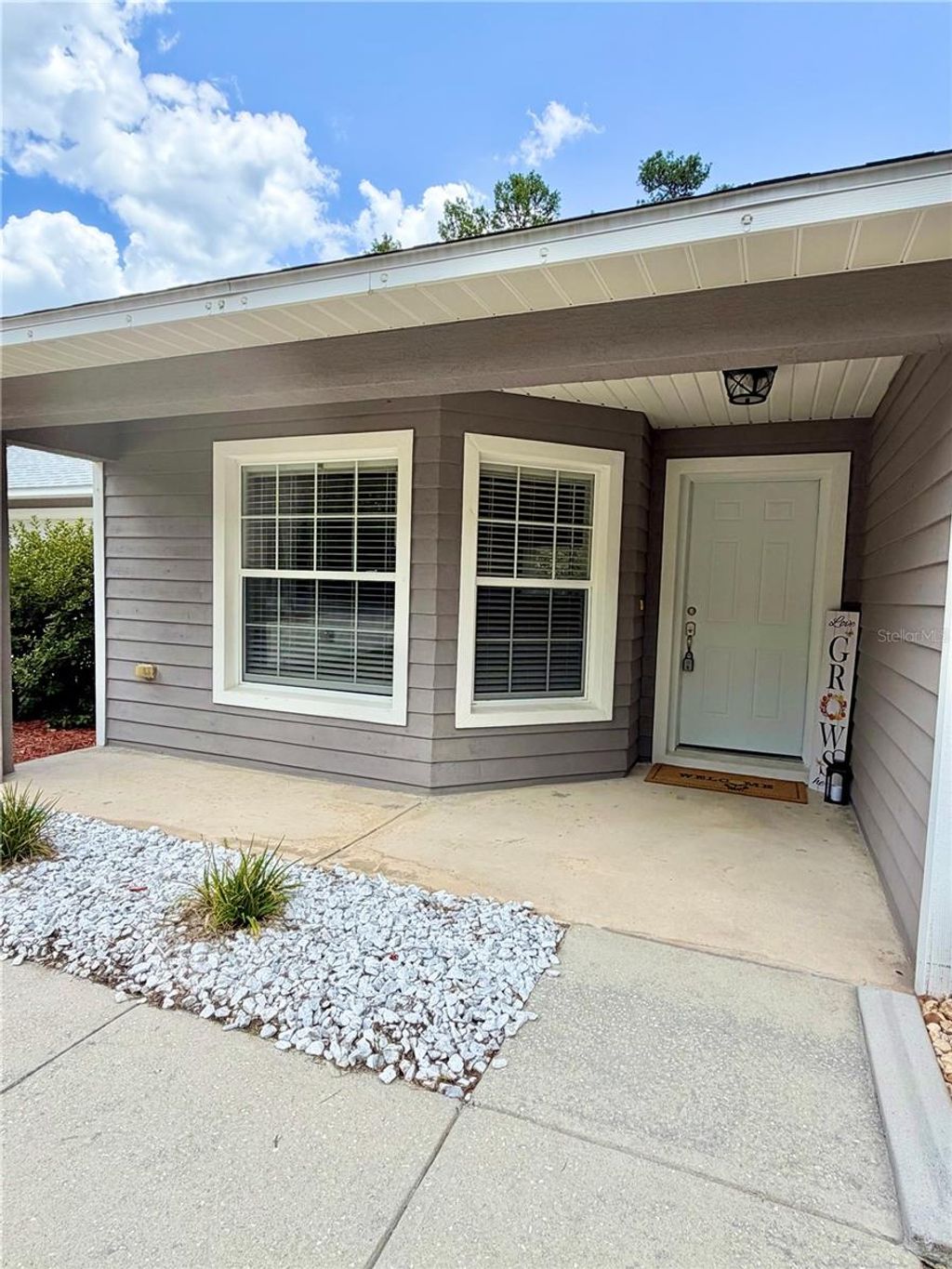 Photo of 13 Fisher Trail Terrace, Ocklawaha, FL 32179 (MLS # R4911639)