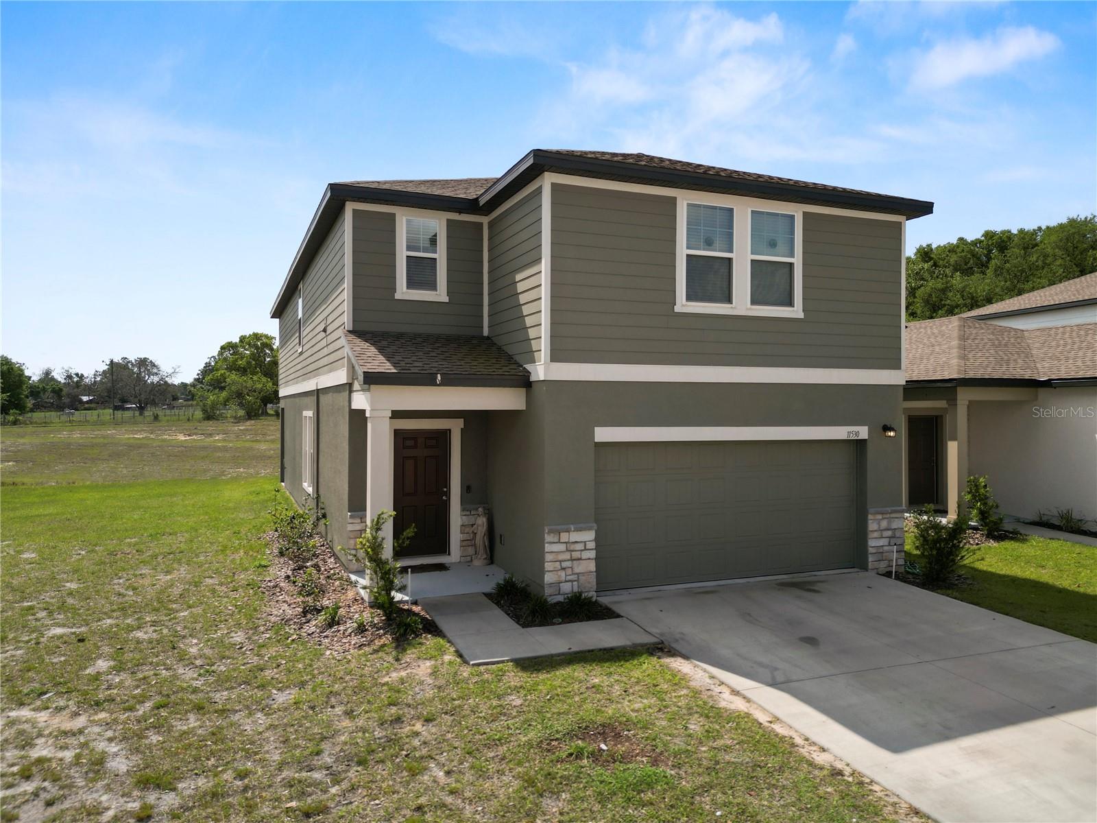 Now Available for Long-Term Lease – 12 Months or More!
Welcome to 11530 Adam Lee Way, Dade City, FL – a spacious 5-bedroom, 4-bathroom two-story home in one of Florida’s rare rolling hill communities. This property offers an ideal long-term living environment with a smart floor plan featuring two Jack-and-Jill bathrooms and a large upstairs loft—perfect as a home office, playroom, or second living area.
The open-concept main floor seamlessly connects the kitchen and family room, creating an inviting space for everyday living. The kitchen is well-appointed with granite countertops, stainless steel appliances, and a generous center island—great for casual meals or entertaining.
Step outside to a private back patio with no rear neighbors—perfect for relaxing mornings and enjoying stunning sunrises. On clear days, you'll even catch views of rocket launches lighting up the sky from the coast!
Situated in a quiet, family-friendly neighborhood with walking trails, a community pool, dog park, tot lot, and more, this home combines the charm of small-town living with the convenience of modern amenities. Located just minutes from Walmart, daily essentials, and downtown Dade City, you'll have access to local dining, shopping, and historic charm.
Outdoor recreation is just around the corner with attractions like TreeHopper Adventure Park, Giraffe Ranch, and Dade City Motocross. Plus, you're under an hour from Tampa—ideal for commuters or those wanting access to the city without sacrificing peace and quiet.
Now accepting applications for long-term tenants (12-month lease or longer). Utilities are the tenant’s responsibility.
Don’t miss this unique rental opportunity. Schedule your private tour today and discover your next home in Dade City!