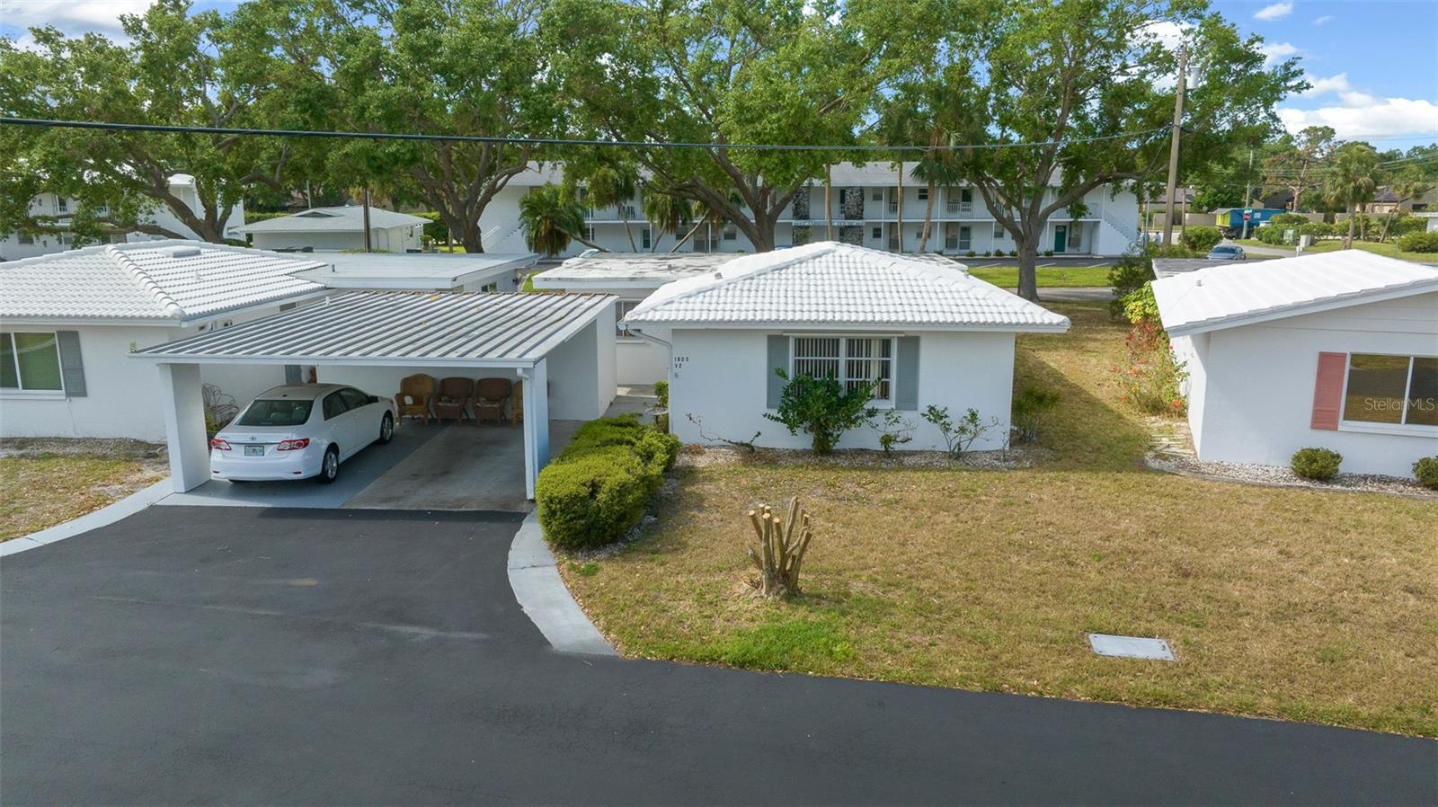 Strathmore Villas, a 55+ community. Conveniently located, this community provides easy access to everything. This 2-bedroom, 2-bath home offers a low monthly fee that covers the exterior, landscaping, water, cable, pool, clubhouse, pest control, and public insurance. This free-standing villa is part of a condominium community with both villas and condo apartments. Residents enjoy tree-lined streets perfect for morning and evening walks. Just 10 minutes from Sarasota’s downtown and UTC’s retail hub, and only 15 minutes from the sandy shores of Lido Beach, this location offers both convenience and potential. Transportation, SRQ Airport, theaters, museums, the Baltimore Orioles’ spring training stadium, and the newly redesigned Bobby Jones Golf Club. Appraised at $180k and priced $15k below.
