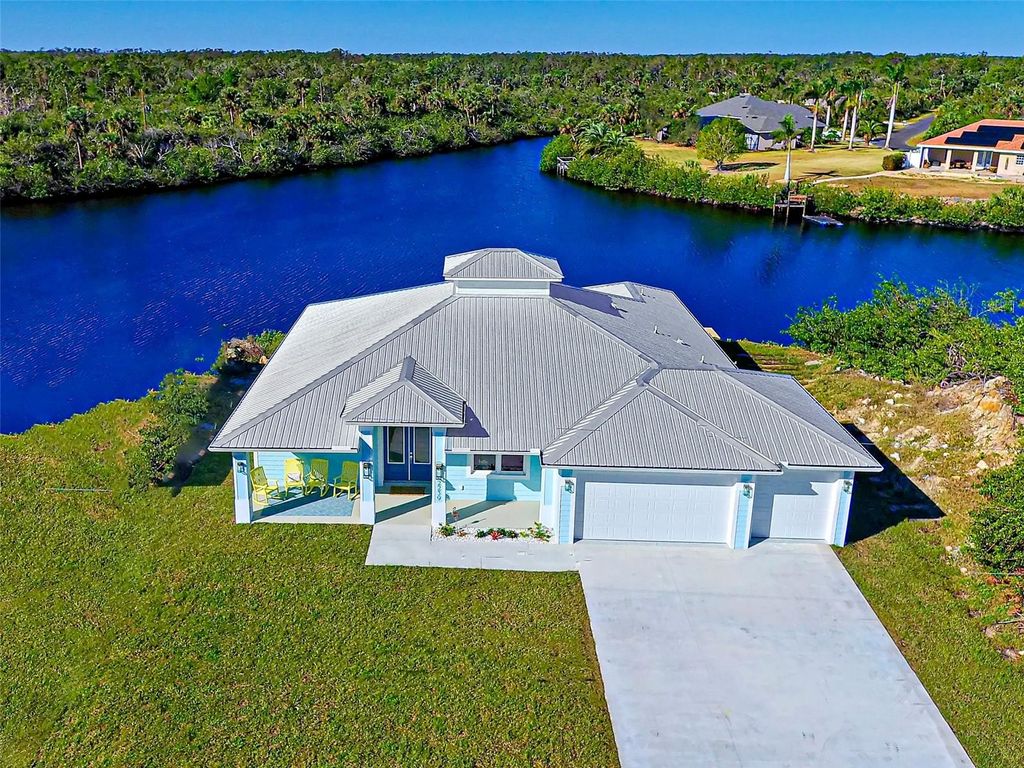 Photo of 2239 Cornelius Boulevard, Port Charlotte, FL 33953 (MLS # C7516584)