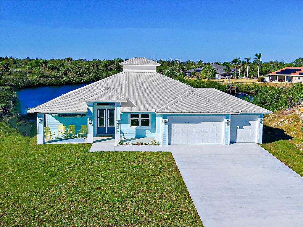 Photo of 2239 Cornelius Boulevard, Port Charlotte, FL 33953 (MLS # C7516584)