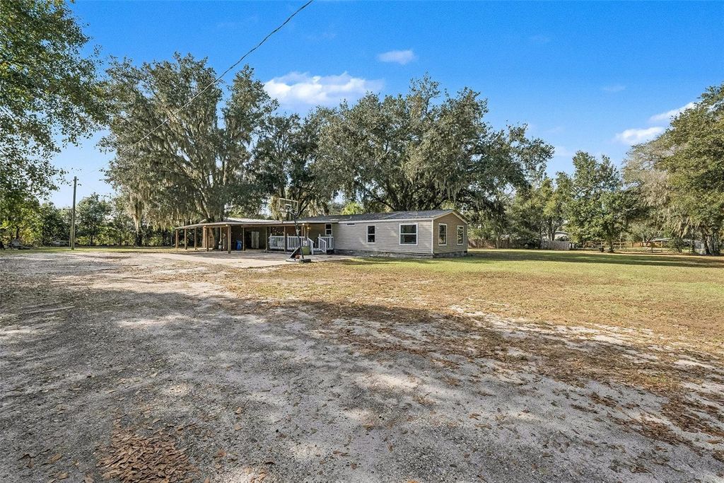 Photo of 5601 Joyce Sheffield Lane, Plant City, FL 33565 (MLS # TB8455034)