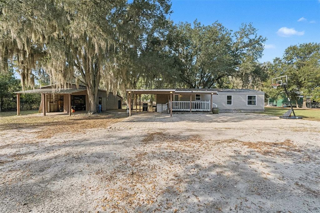 Photo of 5601 Joyce Sheffield Lane, Plant City, FL 33565 (MLS # TB8455034)