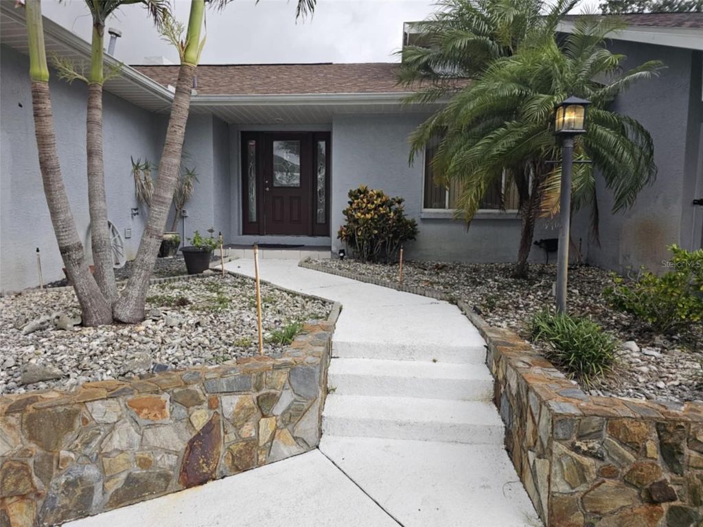 Photo of 2210 Bayou Drive, Holiday, FL 34691 (MLS # TB8399727)