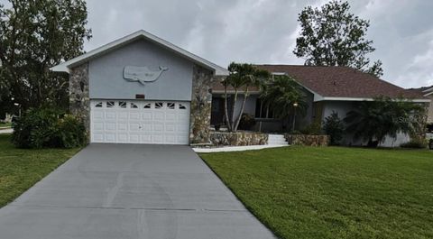 Photo of 2210 Bayou Drive, Holiday, FL 34691 (MLS # TB8399727)