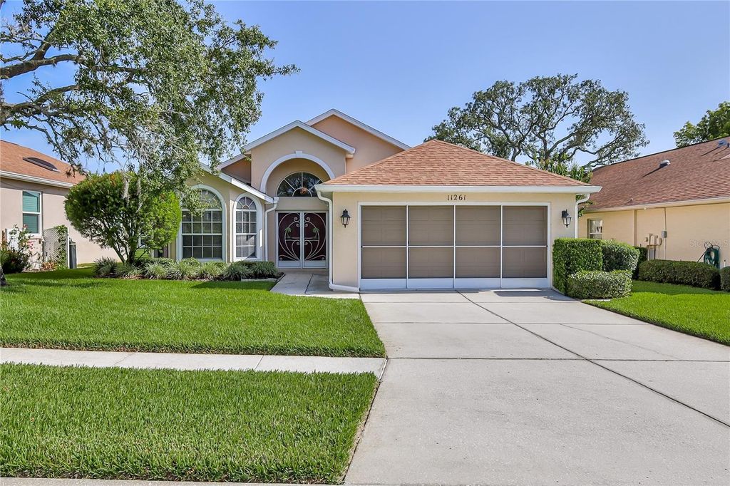 Photo of 11261 Mcracken Drive, Spring Hill, FL 34609 (MLS # W7877632)