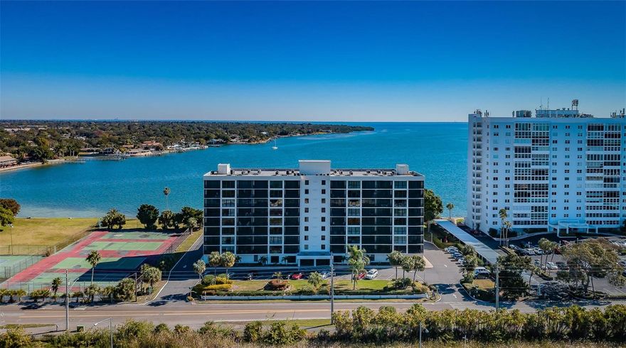 Move-In Ready Waterfront Condo with No Assessments & Milestone Completed. This beautifully remodeled two-bedroom, two-bath condo offers the perfect blend of modern comfort, prime location, and peace of mind. The building has successfully passed its Milestone Inspection, has no assessments, and the unit is fully updated—ready for immediate move-in. Ideally situated just off I-275 and moments from the iconic Skyway Bridge, this home delivers convenience and stunning sunrise views over Tampa Bay right from your doorstep. Highlights & Features include: Prime Location: Only 10 minutes to St. Pete Beach and 15 minutes to vibrant downtown St. Petersburg Split Bedroom Floor Plan: Spacious layout designed for privacy and comfort Modern Interior Updates: Vinyl woodgrain plank flooring throughout and stylishly updated bathrooms with contemporary finishes Gourmet Kitchen: Equipped with stainless steel appliances for effortless cooking
Resort-Style Amenities: Saltwater pool, sundeck, barbecue grills, gym, pool hall, and community room. Ground Floor Convenience: Walk directly from your porch to the pool and grilling area; easy exterior window cleaning. Secure Parking: Assigned space in an enclosed garage with direct lobby and elevator access. Extra Storage: Dedicated garage storage perfect for bikes, paddleboards, and more Laundry Convenience: Updated washer and dryer facilities on every floor. Recent Upgrades: Newer A/C, water heater, and electrical panel Storm Peace of Mind: No damage from recent storms. Some furnishings are negotiable, adding even more flexibility to make this your perfect home. This exceptional condo offers maintenance-free living, unbeatable access to beaches and downtown, and resort-style amenities in a secure and well-maintained community. Schedule your private showing today and experience waterfront living at its finest!