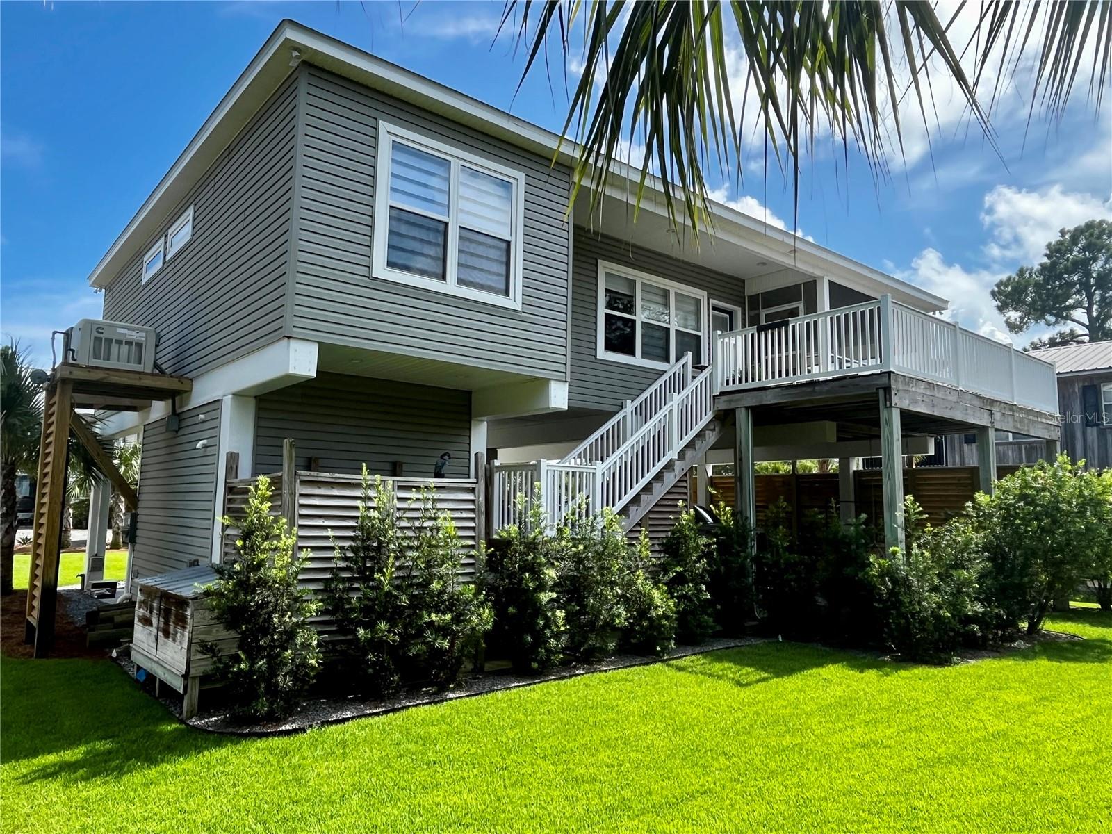 1448 Cypress Street, Alligator Point, FL 32346
Offered at $625,000
3 Bedrooms | 3 Bathrooms | 1,412 Sq Ft
Move-In Ready • Insurance-Friendly • Beautifully Upgraded
Welcome to your slice of paradise in Alligator Point! This meticulously maintained 3-bedroom, 3-bath coastal home (plus a convenient outdoor bath) is move-in ready and full of high-end updates designed for comfort, efficiency, and peace of mind.
Major Improvements:
• 2024 Updates: New HVAC, whole-home generator, tankless water heater, storm shutters, bedroom flooring, recess lighting (indoor/outdoor), fans, blinds (by Made in the Shade), and custom closet systems (Closets by Design).
• Roof: Brand new in August 2023
• Insurance-Friendly: Current premiums are very low
Interior Highlights:
• Stunning kitchen remodel with quartz countertops and premium Bosch appliances
• Spacious great room with vaulted ceilings and a cozy gas fireplace
• Thoughtful layout with three full indoor bathrooms and an additional outdoor full bath
Exterior Features:
• Large screened porch and open deck with a peek of Alligator Harbor — enjoy outdoor entertaining
• Beautifully landscaped yard with native plants, lush lawn, irrigation, lighting, and dedicated irrigation well
• Three-car covered parking for vehicles and boat storage
• Functional workshop/storage area with built in shelves
Prime Location:
• Just a short walk to community beach access
• Less than ½ mile to public boat launch
• Located in a golf cart-friendly community — cruise down to the Marina and the Tiki Bar with ease!
Discover this charming residence located at 1448 Cypress St in Panacea, FL. This delightful home features spacious living areas and a well-appointed kitchen, appropriate for culinary enthusiasts. Enjoy the comfort of the cozy bedrooms and the tranquility of the backyard, appropriate for relaxation. With its inviting atmosphere and convenient location, this property offers a wonderful living experience. Don't miss the opportunity to make this house your new home.
