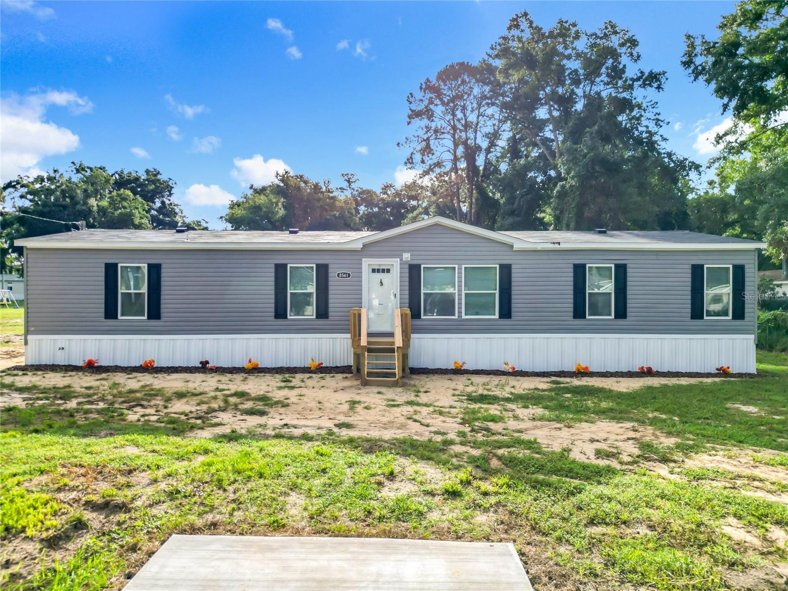Excellent opportunity to own a BRAND NEW, Spacious Manufactured Home in Concordia Park. It is settled on .23 acre and features 4 spacious bedrooms and two full bathrooms. Everything is new! Brand-new HVAC, roof and kitchen, granite countertops. Own your lot! One of the key highlights of this home is the absence of an HOA, offering homeowners freedom from restrictive rules and additional fees. Experience the benefits of new construction, including energy-efficient windows, contemporary finishes, and a floor plan designed for today's lifestyle. The open concept living area provides a seamless flow between the kitchen with spacious pantry, dining, and living room. Big laundry room with its own entrance. Natural light floods the space making it looks modern and functional. New septic system and the well. Financeable, Insurable with abundant space to spread out inside or outside to enjoy family, friends and plenty of private space to find your quiet zone. Master bathroom has shower and garden tub. All bedrooms have walk-in closets.
Located just minutes from Highway 441, this home offers convenient access to shopping, dining, and local amenities.
easy travel to Downtown Ocala (10 min) Gainesville (30min) Tampa and/or Orlando (1:15 min), AND UNDER 20 MINUTES FROM THE WORLD EQUESTRIAN CENTER. Ocala is a up-and coming city with lots of great restaurants, entertainment, and not far from the University of Florida. Quite, tranquil neighborhood, Concordia Park is home of the North District Marion County Sheriff's office.
