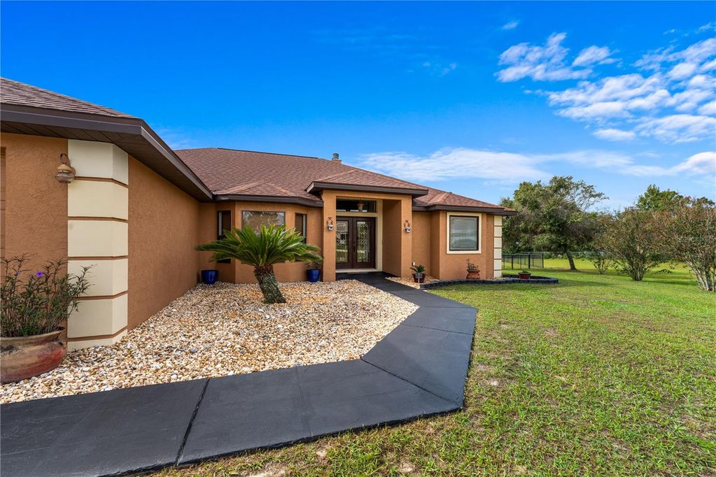 Photo of 10910 SW 45th Terrace, Ocala, FL 34476 (MLS # S5135984)
