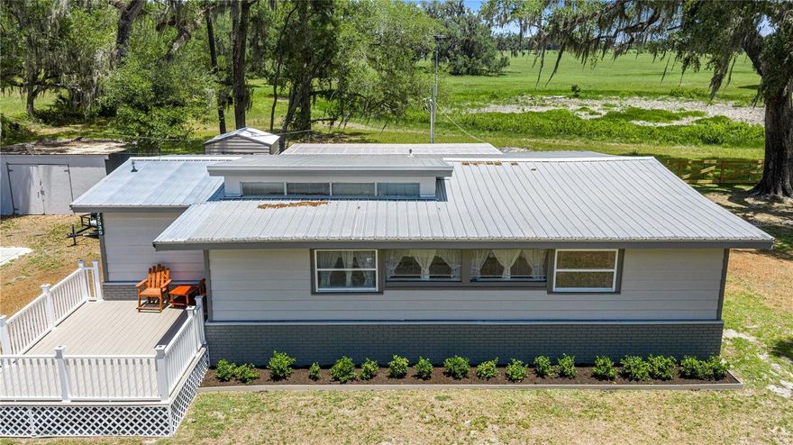 A fresh beautiful home here in wonderful Dunnellon.  This home would be a great investment for anyone from snowbirds to first time homeowners or a great retirement home.  Starting from the top yes, a metal roof, new paint in and out.  Two new tankless hot water systems, a new commercial level heat pump.  The list goes on from kitchen to flooring to ceiling fans.  Your best option is to view this home in person.  Great location to store your boat that is concrete and covered.  Community has its own private boat launch and dock.  There's a new 50 Amp RV site also.  The Goethe State Forrest is within a few minutes, and the Gulf of America is also very nearby.  Don't forget about the Rainbow River and yes, you could motor to it in your boat from the private launch area, IE no crowds.  Dunnellon offers excellent shopping and dining, great schools and not a lot of congestion to deal with.  If you still need the big city life you are in luck Ocala, Gainesville are a short drive and big cities like Tampa and Orlando are with 90 miles.