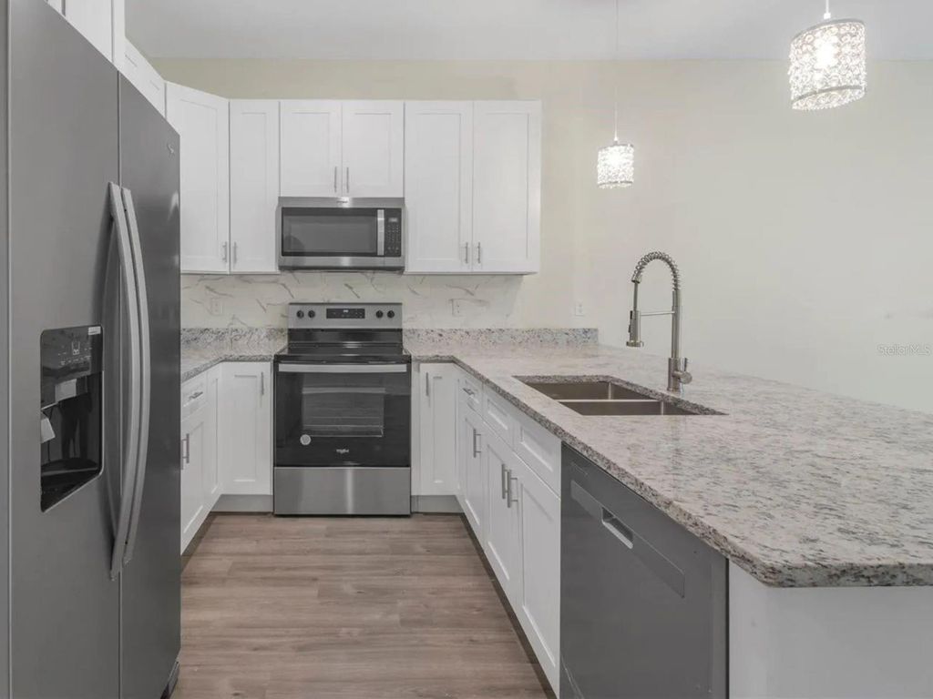 Photo of 11974 Tetzel Avenue, Port Charlotte, FL 33981 (MLS # D6144442)