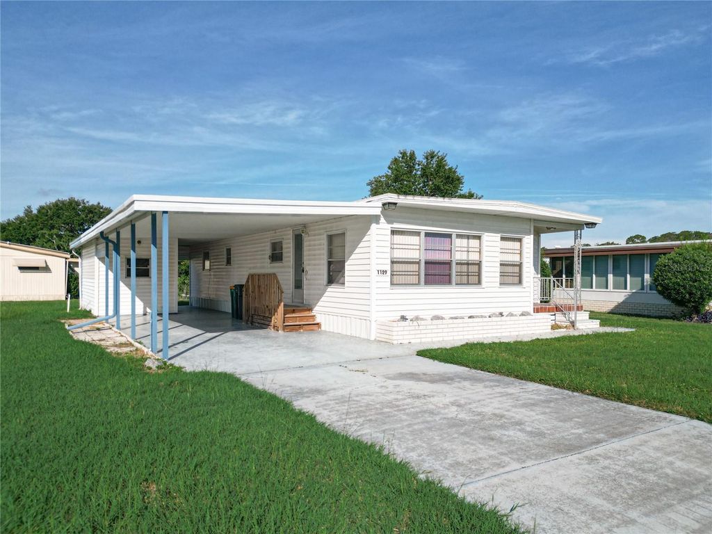 Photo of 1129 Elkhart Circle, Tavares, FL 32778 (MLS # G5093410)