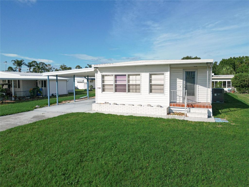 Photo of 1129 Elkhart Circle, Tavares, FL 32778 (MLS # G5093410)