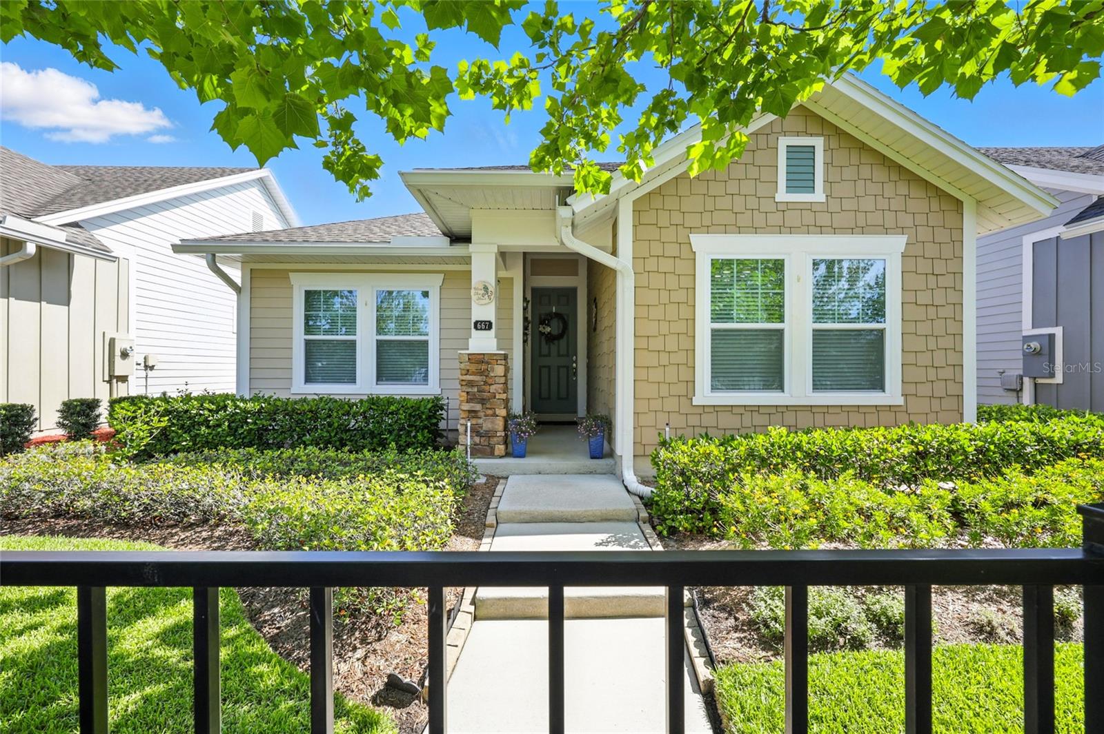 Welcome to the perfect blend of comfort, convenience, and community living! This beautifully maintained 2 BEDROOM, 2 BATH HOME is nestled in a MASTER-PLANNED COMMUNITY known for its charm, walkability, and resort-style amenities. Step inside to find QUARTZ COUNTERTOPS THROUGHOUT, a WHOLE-HOUSE WATER FILTRATION SYSTEM, and a GAS STOVE paired with a TANKLESS WATER HEATER for energy-efficient living.
The spacious PRIMARY SUITE is a true retreat, featuring a LUXURIOUS ENSUITE BATH with DUAL VANITY, a PRIVATE WATER CLOSET, a LARGE WALK-IN CLOSET, and a custom GLASS SHOWER ENCLOSURE added to eliminate chilly drafts. Enjoy peaceful mornings or breezy evenings in the SCREENED-IN, PAVERED LANAI, perfect for relaxing or entertaining.
This home also includes a REAR-ENTRY GARAGE with a LONG DRIVEWAY, plus DESIGNATED FRONT GUEST PARKING—a rare and valuable feature! Just a short walk from your front door, enjoy a vibrant village lifestyle with SHOPS AND RESTAURANTS, as well as FAMILY-FRIENDLY AMENITIES including a SPLASH PARK WITH SLIDES, a LAZY RIVER, and more.
Whether you’re looking to downsize, invest, or enjoy low-maintenance living with upscale touches in a thriving community, this home checks all the boxes
