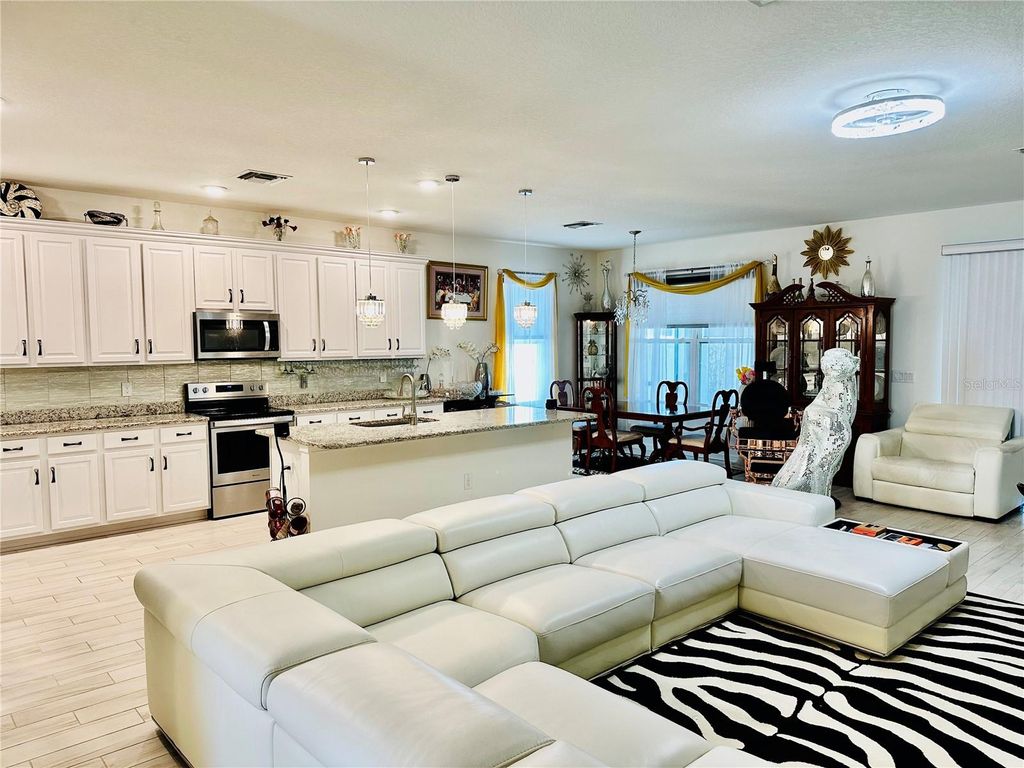 Photo of 944 Old Windsor Way, Spring Hill, FL 34609 (MLS # TB8508275)