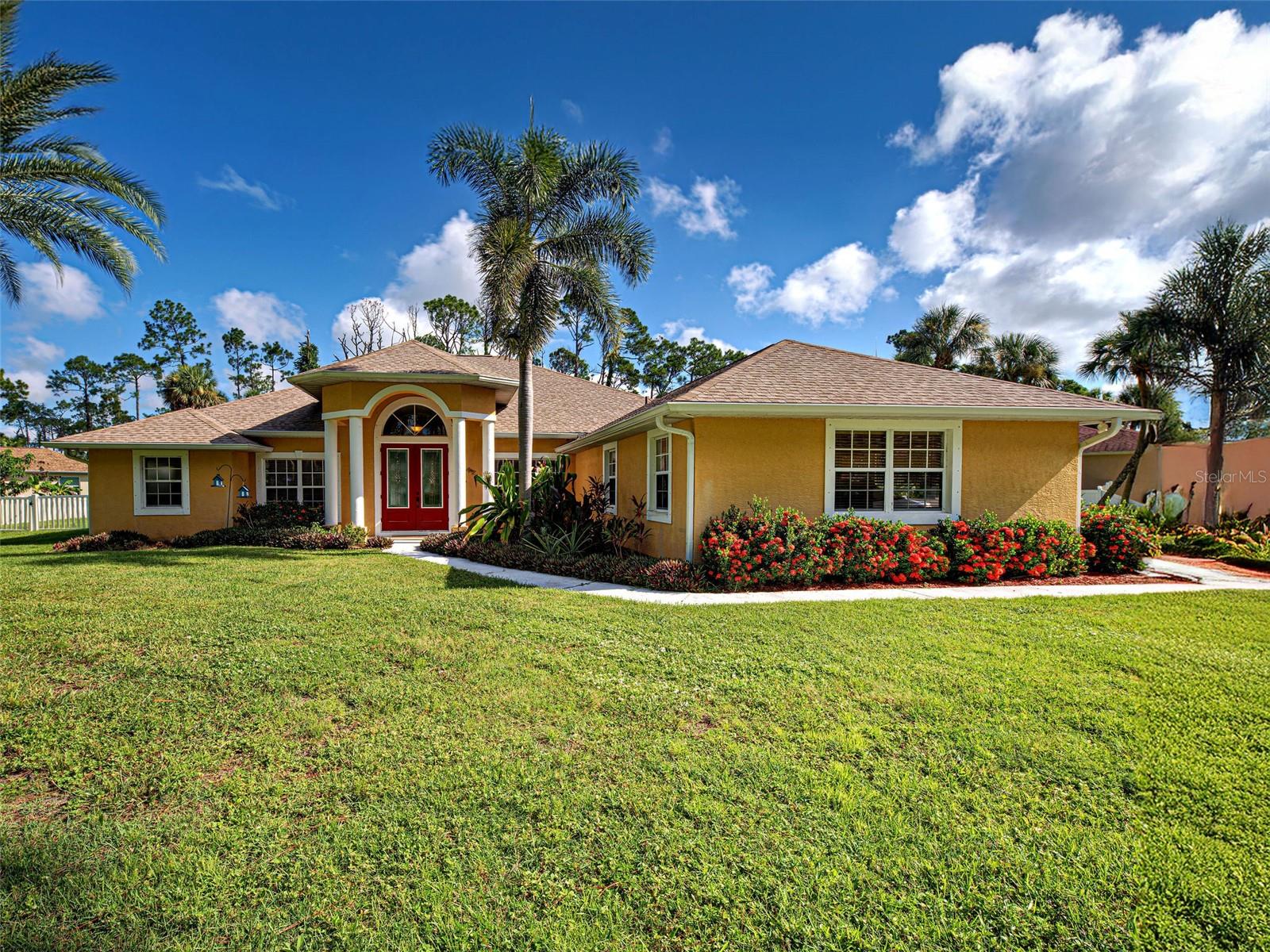 Beautifully appointed 4-BEDROOM, 3-BATH POOL HOME with OFFICE on an expansive .87-ACRE CORNER LOT in North Port. This residence offers a SPLIT FLOOR PLAN, HIGH CEILINGS, FORMAL DINING, spacious LIVING ROOM, inviting FAMILY ROOM, private OFFICE, 1 Year Old Roof and Whole House Reverse Osmosis System! The SPACIOUS PRIMARY BEDROOM features DUAL CLOSETS and a spa-inspired en-suite bathroom with SOAKING TUB, BUILT-IN VANITY, DUAL SINKS, and LARGE SHOWER with direct access to the lanai. Guest bedrooms are generously sized with LARGE CLOSETS and ABUNDANT NATURAL LIGHT. The KITCHEN offers a BREAKFAST BAR, CORIAN COUNTERTOPS, BUILT-IN PANTRY, and overlooks the family room currently enjoyed as a GAME ROOM. Through sliding glass doors, step out to the SCREENED LANAI featuring an IN-GROUND POOL and OUTDOOR KITCHEN—offering the perfect setting to ENTERTAIN or RELAX while enjoying peaceful yard views. Ideally located just minutes from the FUTURE SARASOTA MEMORIAL HOSPITAL, shopping, dining, I-75, and only a SHORT DRIVE to the GULF BEACHES, this home delivers the perfect balance of PRIVACY, ELEGANCE, and FLORIDA LIFESTYLE. Schedule your private showing today!
