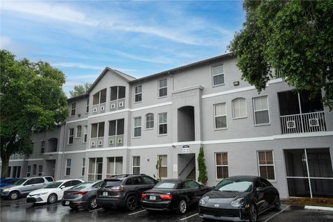 Photo of 5011 Sunridge Palms Drive #204, Tampa, FL 33617 (MLS # TB8499563)