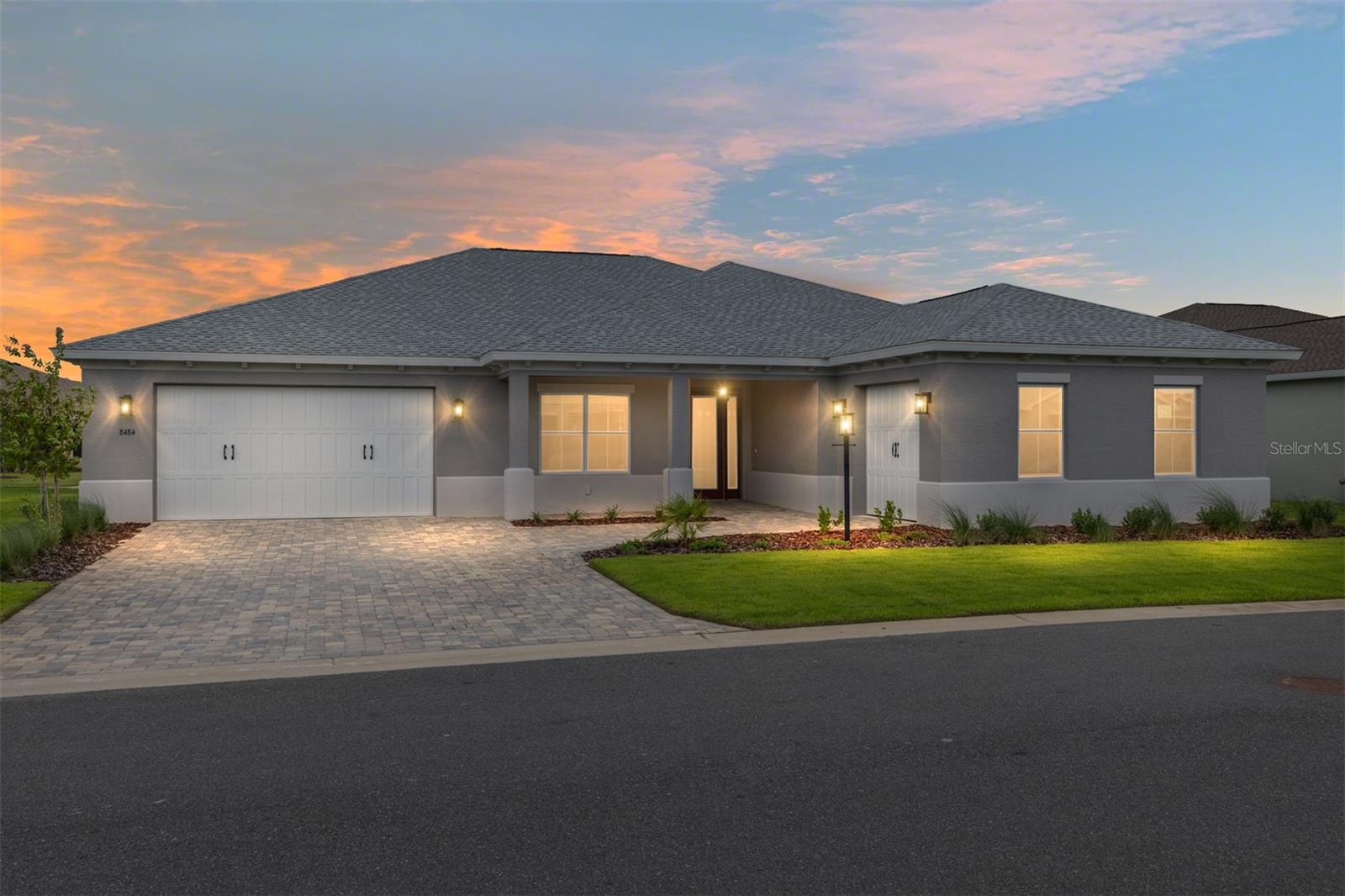 Welcome to the Dunbar model, a stunning 3-bedroom, 3-bathroom home with a 3-car garage, located in the highly desirable Balfour neighborhood of On Top of the World. This new construction home combines elegance and functionality, featuring a paver driveway and walkway, luxury vinyl flooring throughout, and an open-concept layout perfect for entertaining and everyday living. The gourmet kitchen is a chef’s dream, with staggered cabinets with crown molding, under-cabinet lighting, a walk-in pantry, a built-in oven and microwave, a 5-burner cooktop with range hood, stainless steel refrigerator, and an oversized island ideal for meal prep and casual dining. Entertaining is effortless with the great room that opens to a screened lanai via a 4-panel sliding door, creating seamless indoor-outdoor living. The master suite is a private retreat, boasting a 3-panel window with blinds overlooking the backyard, a walk-in closet with through-access to the laundry room for added convenience, and a luxurious en suite bathroom with tile flooring, a double vanity with quartz countertop, and a zero-entry tiled shower with built-in bench. One of the additional bedrooms also features an ensuite with tile flooring and a walk-in shower with sliding glass door, providing comfort and privacy for guests. The split-bedroom layout ensures privacy throughout, while the 3-car garage offers ample parking and storage. Living in Balfour at On Top of the World grants access to world-class amenities, including championship golf courses, fitness centers, swimming pools, tennis, pickleball, and countless clubs and activities designed for active adult living.