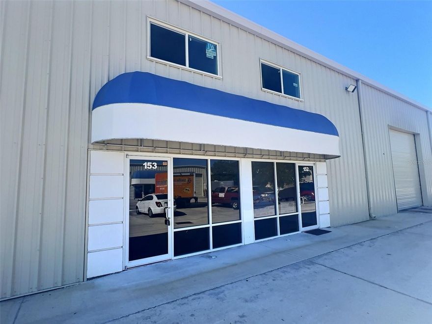 New construction (2022) with glass front, glass entry door, 2 offices, restroom and 2 roll-up doors.
Warehouse features 16’-19’ ceilings, mezzanine storage and humidity control.
14' drive-in rollup door in front of unit. 8' rollup at rear of unit for access to rear patio.
Zoned City of Bunnell L-1 (Light Industrial). Automotive repair and adult businesses are not permitted in the complex.
Centrally located on US1 in Flagler County.  Minutes to Palm Coast Parkway and SR 100.
Excellent location for retail, building trades, showroom, etc.
Convenient access to I-95 to the north, south and east.