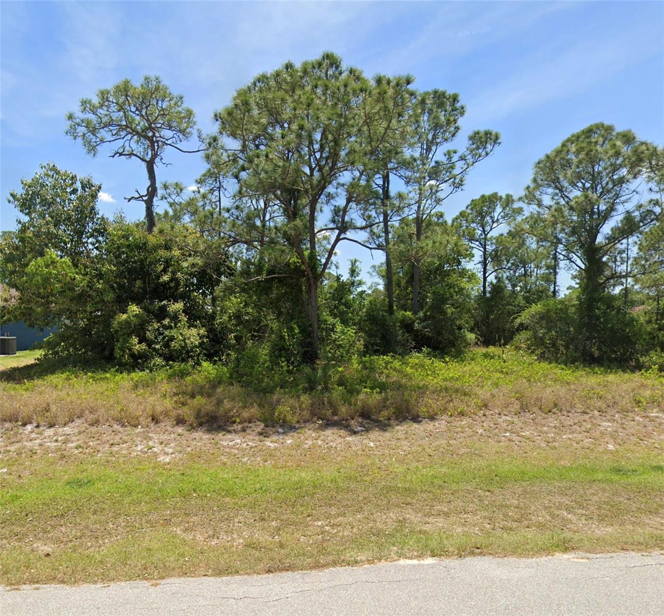 Almost a quarter-acre lot in Fairway Lake Estates of Sebring, located on a paved road and ready for your future home! Clear the land and develop this residential lot to your vision. This peaceful community offers a quiet retreat close to nature while still keeping you just minutes from all of Sebring’s conveniences. Within a 10-minute drive, you’ll find Publix, Lakeshore Mall, Walmart, Ross, Michaels, Outback, and Olive Garden. Downtown Sebring Circle is also nearby, hosting unique shops, restaurants, and year-round events and craft fairs. The Highlands County Library, public park, and the sandy beach at Lake Jackson are all just around the corner. Don’t miss the chance to build your dream home in this inviting community!
