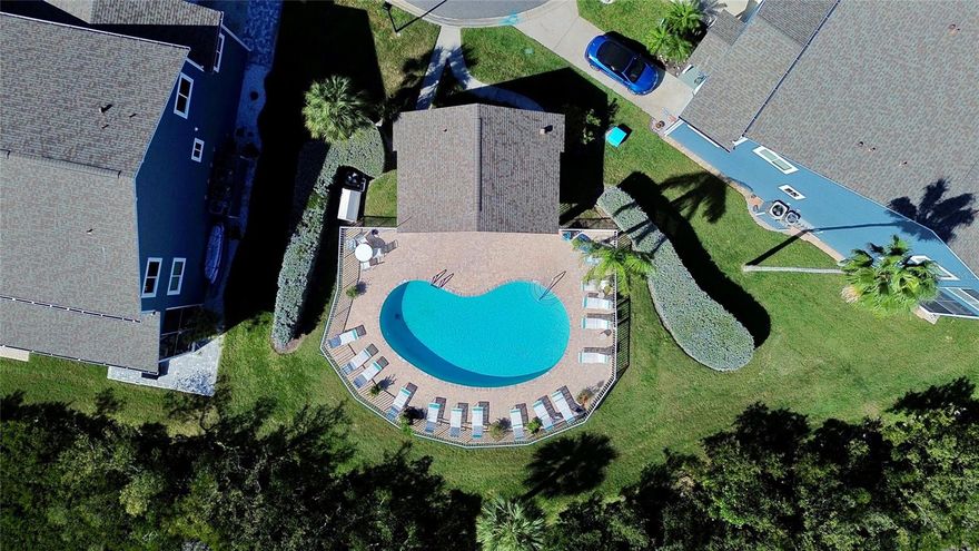 Your Beautiful water front community with pool on the inter-coastal waterway and walking distance to the Gulf of America. This home is completely renovated inside and out with a new roof, fully updated electric and plumbing, lighting and doors. Relax in this gorgeous home adorned with exotic ocean light fantasy brown real granite in all rooms including kitchen and bathrooms. Your updated kitchen, extended in height and width with additional cabinets and counter space, extra GFIs and lighting will please any Chef.  All bathrooms boast of exquisite extra large porcelain high format tiles. Custom made functional shutters throughout home. The custom installed safety-glass stair enclosures & bath and shower enclosures in all 3 en suite bathrooms, create a feeling of spacious luxury. Freshly painted throughout with brand new exterior siding. You will love to walk to the beach for sunrise and sunset everyday; walk or bicycle to the Park, Restaurants, Beach Bars or Dog Park. Your hugh 3-4 car garage is large enough for all your vehicles, golf cart, beach toys, kayaks and workshop. Be sure to see the community dock on the inter-coastal and the community pool. Move in ready; All that's missing is you. Fireplace and washer and dryer do convey with the sale of the home. Schedule your tour today.