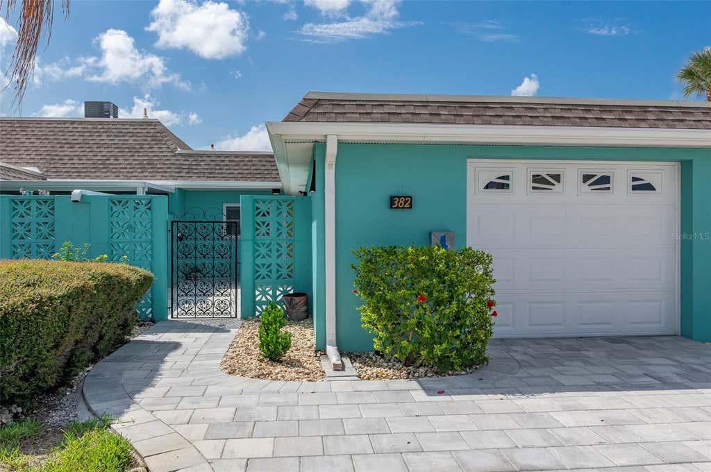 Photo of 382 Boca Ciega Point Boulevard S, St Petersburg, FL 33708 (MLS # TB8540771)