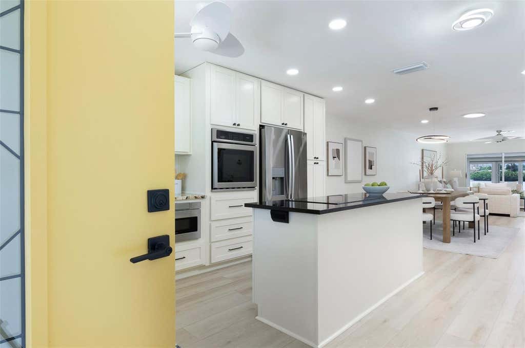 Photo of 382 Boca Ciega Point Boulevard S, St Petersburg, FL 33708 (MLS # TB8540771)