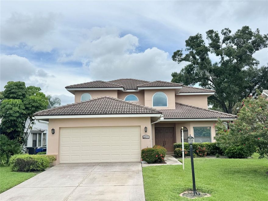 Located in Sarasota's highly desired Longwood Run community, this spacious 4-bedroom, 2.5-bath home offers a bright, airy interior and a functional two-story layout perfect for family living and entertaining. Enjoy easy-to-maintain laminate vinyl and tile flooring throughout – no carpet here! The home features two distinct living rooms: a private, enclosed space for quiet relaxation, perfect for a formal dining room, and an open-concept area that seamlessly connects to the kitchen and dining. Sunlight floods both spaces, with sliding glass doors opening to a backyard oasis. This outdoor haven boasts a sparkling, screened-in swimming pool, an expansive covered lanai with a grilling area, and ample space for lounging or outdoor dining, effortlessly blending indoor comfort with outdoor enjoyment. The heart of the home is a spacious kitchen with warm wooden cabinetry, elegant granite countertops, a center island breakfast bar, and an modern dark-finished appliance package. The dining area, seamlessly connected to the kitchen, is illuminated by stylish pendant lighting and benefits from abundant natural light, enhancing the bright and airy feel of the entire space. The main level includes a convenient first-floor bedroom, a half bath, and a laundry room, ideal for guests or a home office. Upstairs, the spacious primary suite offers a walk-in closet and an en-suite with a double vanity and large glass shower. The two other upstairs bedrooms feature ample closet space, ceiling fans, and large windows, sharing a full bathroom with a granite-topped vanity, tiled floor, and a shower/tub combo. This home also includes a two-car garage, providing ample parking and storage. The highly sought-after Sarasota location truly sets this home apart. Enjoy an exceptional Sarasota lifestyle just minutes from the world-class shopping and dining destination of UTC, offering an endless array of stores and restaurants. Its prime location also provides quick access to Sarasota-Bradenton International Airport (SRQ), recreational opportunities at Nathan Benderson Park, and I-75 for convenient travel to Sarasota's stunning Gulf beaches and beyond. NOTE: This community is governed by a homeowners association. Approval may include an application, background screening, fees, and an approval process. Contact the agent for details.