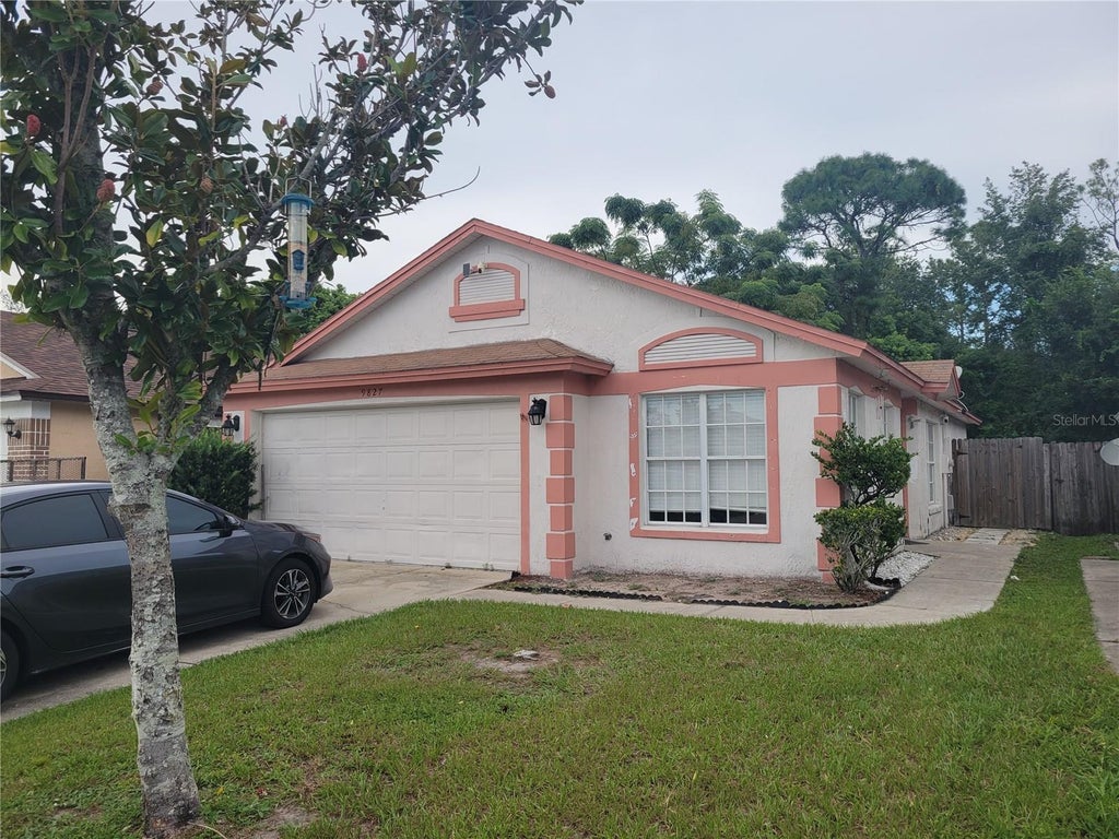 Photo of 9827 Dean Cove Lane, Orlando, FL 32825 (MLS # O6445687)