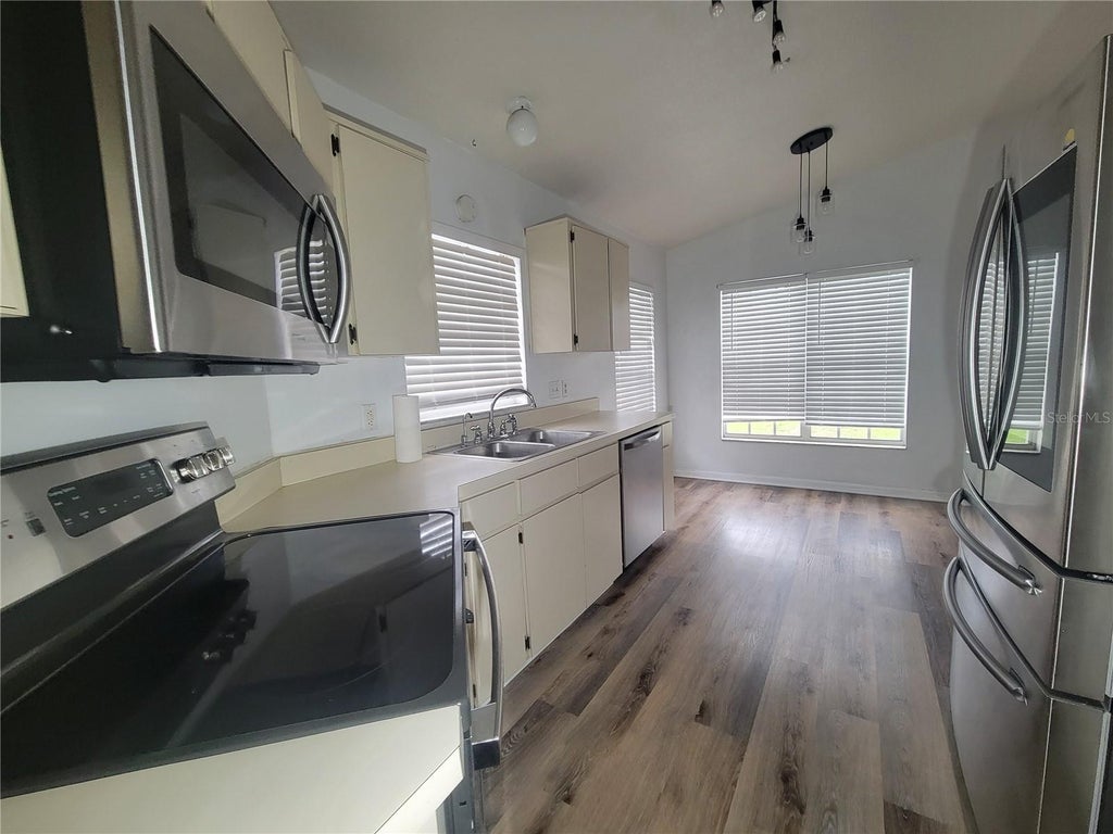 Photo of 9827 Dean Cove Lane, Orlando, FL 32825 (MLS # O6445687)