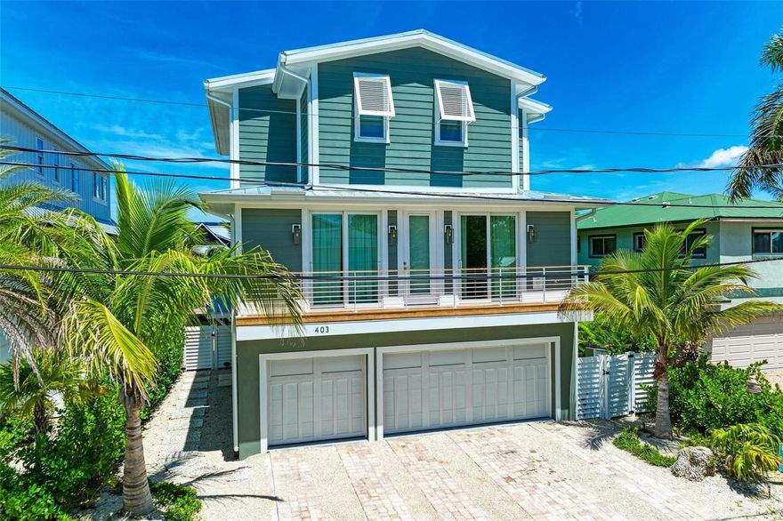 SEVEN BEDROOM ISLAND HOME – PERFECT FOR YOUR LARGE FAMILY OR AS A HIGHLY RENTABLE VACATION GETAWAY
Live the ultimate Anna Maria Island lifestyle in this stunning 7-bedroom, 7.5-bath coastal luxury home with a private heated saltwater pool and spa, right on a waterfront canal with boat access to the Intracoastal Waterway and all of Tampa Bay. Just three homes from the bay and a short walk to the beach, this home puts you in the heart of island living.
The main level is made for entertaining, featuring an open concept living, dining, and gourmet kitchen with custom wood cabinetry, quartz countertops, high-end stainless-steel appliances, and a spacious center island. Two bedrooms, two and a half baths, a convenient utility room, and multiple porches and decks complete this level for effortless indoor-outdoor living.
Upstairs, discover five additional bedrooms and baths, each with unique design touches. The master suite boasts a private balcony overlooking the canal and Anna Maria Sound. An elevator provides easy access to all levels, and the three-car garage offers plenty of storage.
Step outside to your waterfront paradise—a heated saltwater pool and spa set against your canal backdrop. Whether you want to take a short stroll to catch breathtaking sunsets or hop on your boat and explore, this home delivers the best of Anna Maria Island living.