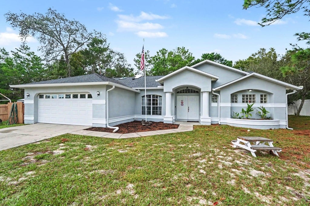 Photo of 12101 Peregrine Falcon Avenue #6, Brooksville, FL 34614 (MLS # TB8555010)