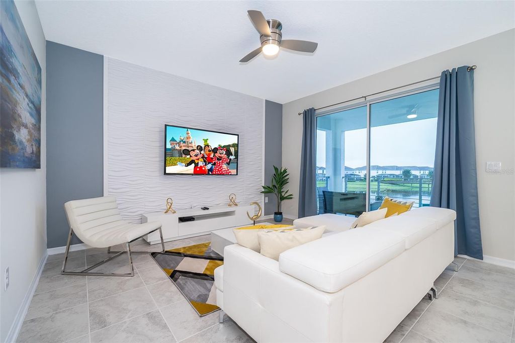 Photo of 3131 Paradox Circle #202, Kissimmee, FL 34746 (MLS # O6376369)