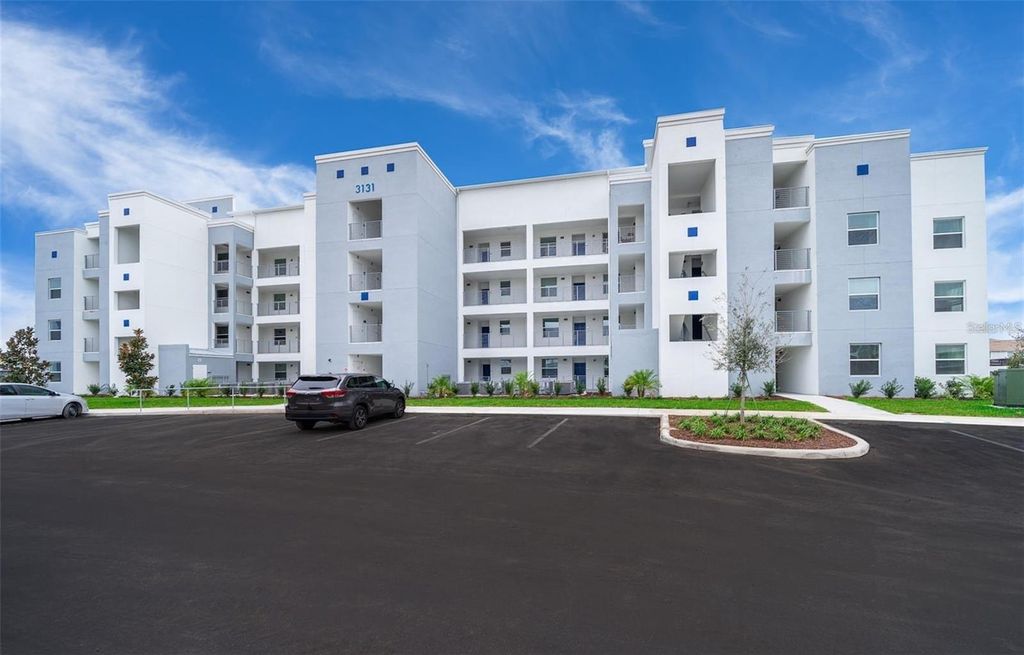 Photo of 3131 Paradox Circle #202, Kissimmee, FL 34746 (MLS # O6376369)