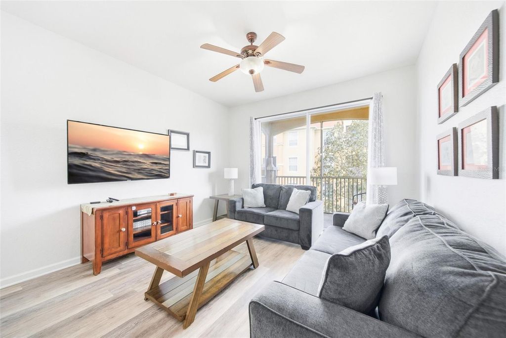 Photo of 2778 Almaton Loop #302, Kissimmee, FL 34747 (MLS # O6352860)