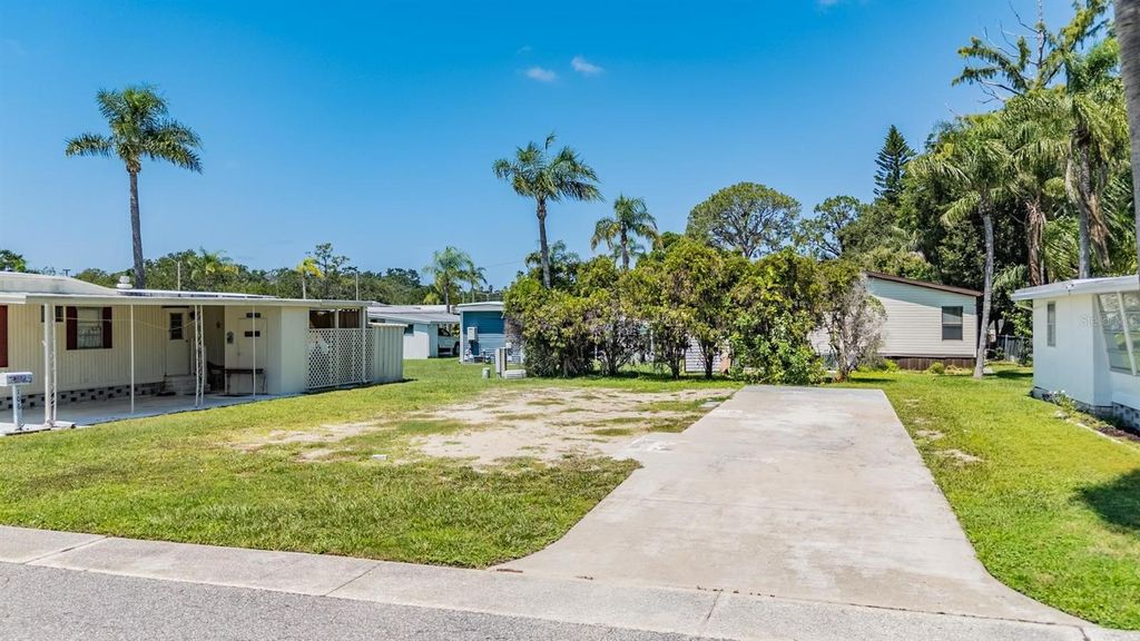 Photo of 605 Michigan Boulevard #105, Dunedin, FL 34698 (MLS # TB8412454)