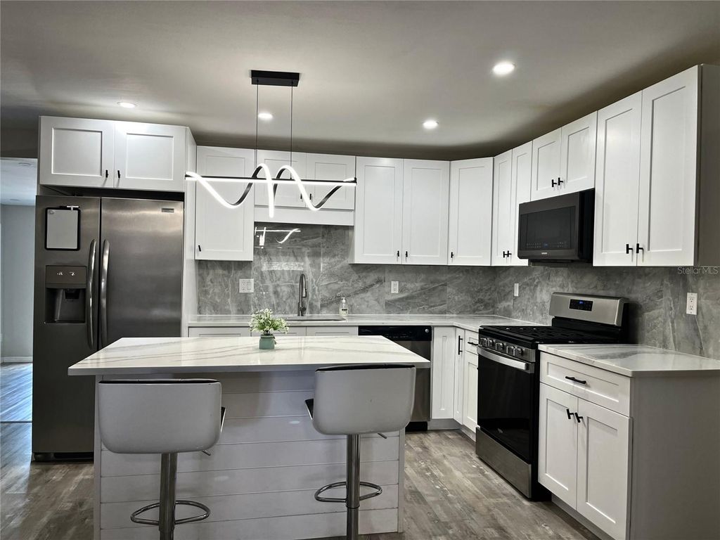 Photo of 1039 N Missouri Avenue, Clearwater, FL 33755 (MLS # TB8488693)