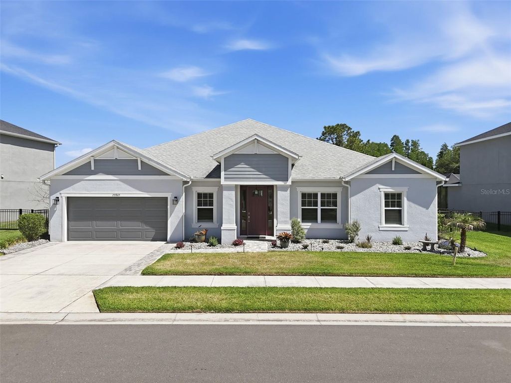 Photo of 33805 Castaway Loop, Wesley Chapel, FL 33543 (MLS # TB8502314)