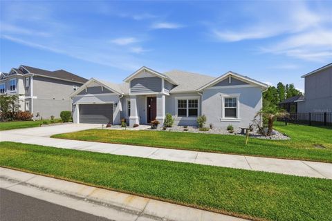 Photo of 33805 Castaway Loop, Wesley Chapel, FL 33543 (MLS # TB8502314)