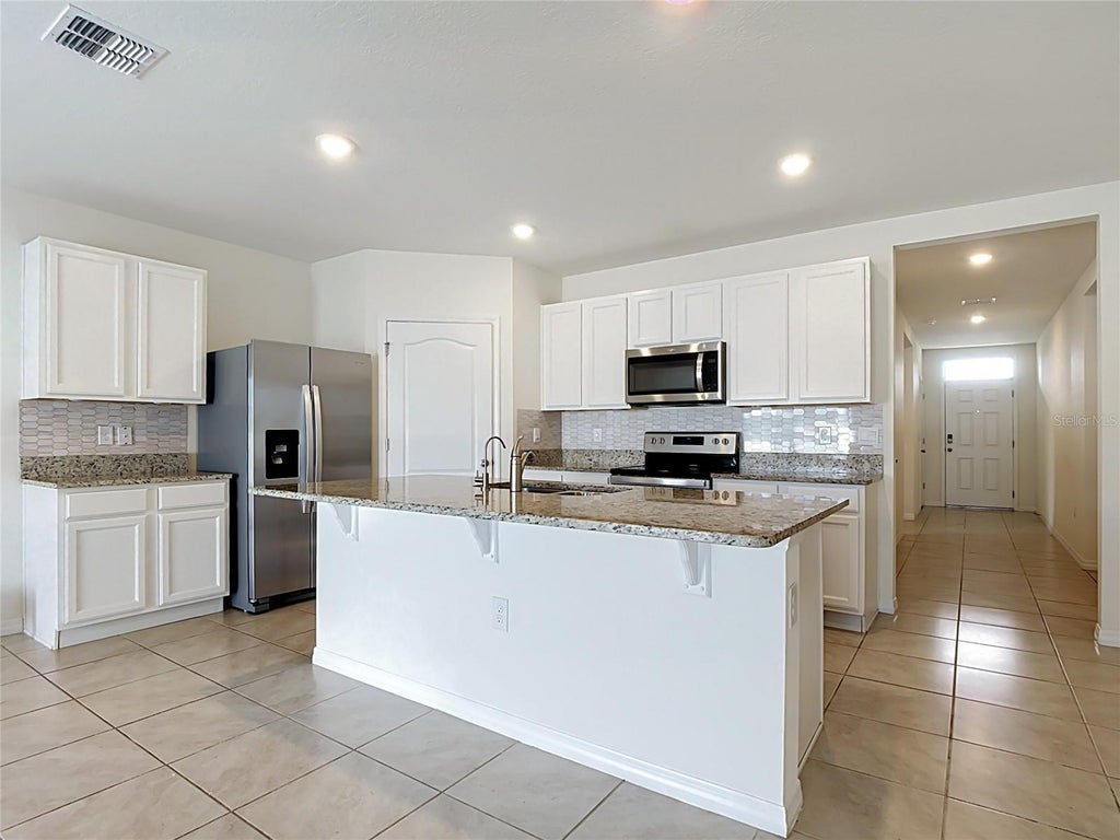 Photo of 3956 E Magenta Place, Saint Cloud, FL 34772 (MLS # O6447449)