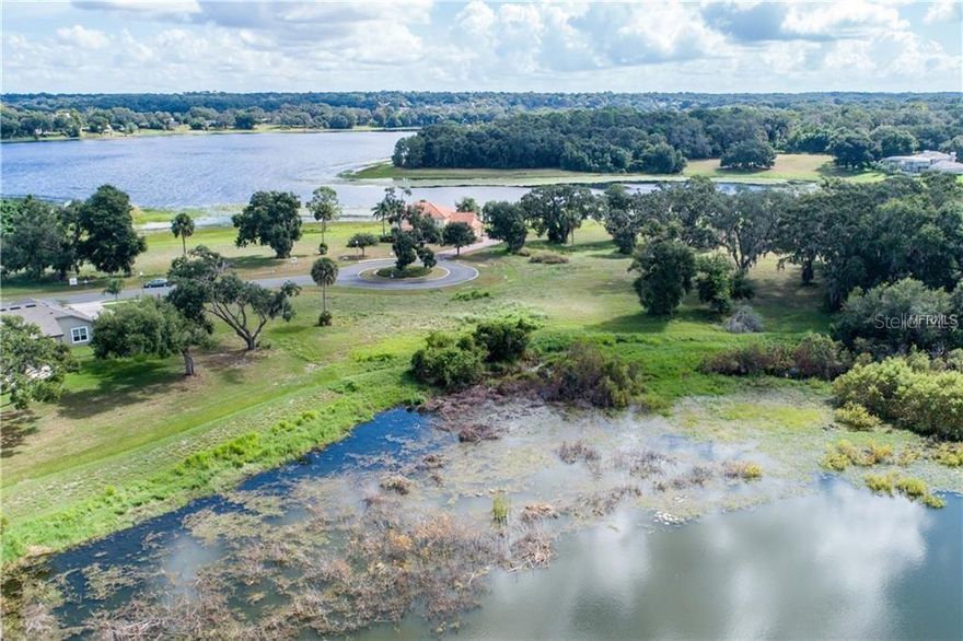 LOT 16 CROOKED LAKE RESERVE - 0.98 ACRE LOT. LAKE DICIE FRONTAGE. Crooked Lake Reserve is a small lakefront community of 25 home sites with gorgeous waterfront views located in Eustis, Florida - America’s Home Town, and surrounded by West Crooked Lake and Lake Dicie. Presented by Kevco Builders, Inc., Crooked Lake Reserve features 13 available and affordable home sites in a private deed-restricted subdivision with low HOA fees. If you are seeking the opportunity to build your own home on a picturesque street, and within minutes to shopping, dining and commuter routes, you can't pass this up! Take the guesswork out of the building process when you utilize Kevco Builders, Inc. -- Lake County's most award-winning and trusted builder with over 35 years of experience. Take advantage of this fantastic opportunity. Kevco Builders offers both a "blank canvas" to help you design your custom dream home from the ground-up, or a selection of award-winning floor plans which you can use as an inspiration to customize or build as-is. Just an hour's drive from Crooked Lake Reserve you can be at the many theme parks, beaches and attractions located in Central Florida, including Orlando, and New Smyrna Beach. And you're only 5 minutes away to the picturesque New England-style village of Mount Dora with its galleries, sidewalk cafes, and full calendar of award winning festivals. Call me today to schedule an appointment to view our Crooked Lake Reserve model home!